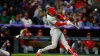 Bohm leads a comeback at Coors Field that puts Phillies in first place